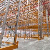 Yellow Pallet Racking Installation In A Warehouse