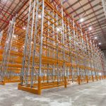 A large warehouse filled with selective pallet racking.