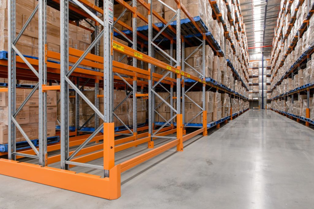 Double deep pallet racking partially loaded.